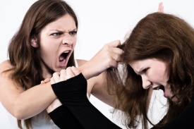Two women fighting and screaming
